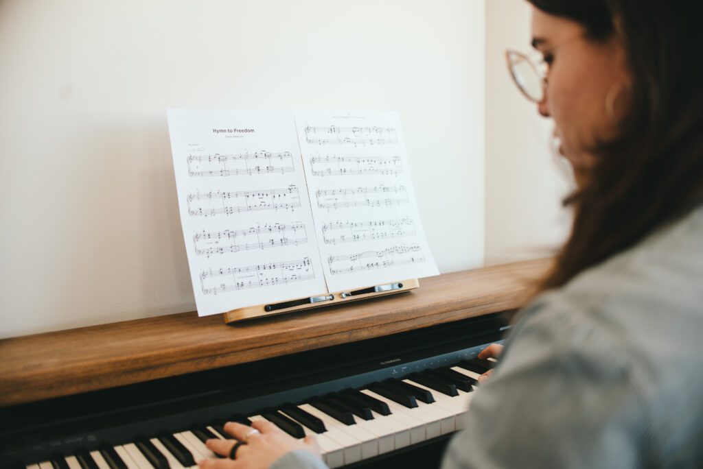 Playing sheet music on piano