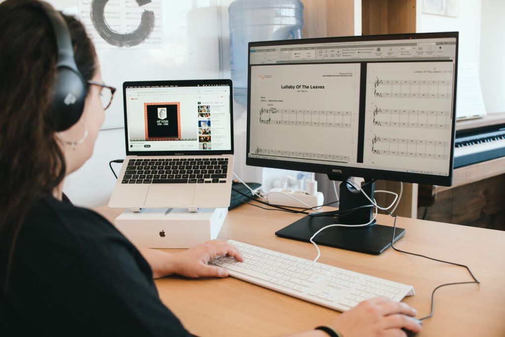 Musician transcribing sheet music