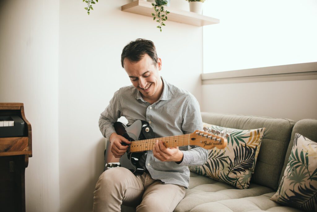 Person playing guitar